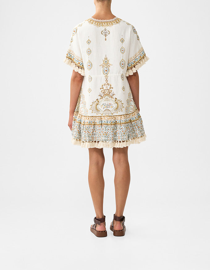 Person wearing a white dress with gold embroidery on a white background. Ottoman Dynasty Short V Neck Embroidered Dress