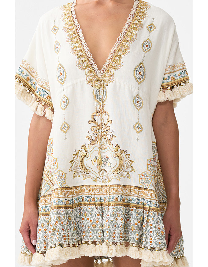 White dress with gold and blue embroidery and tassels on a white background. Ottoman Dynasty Short V Neck Embroidered Dress