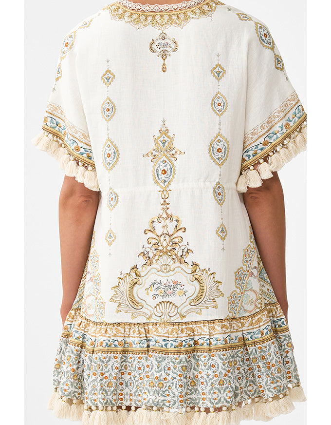 White dress with intricate gold and multicolor patterns on a white background. Ottoman Dynasty Short V Neck Embroidered Dress
