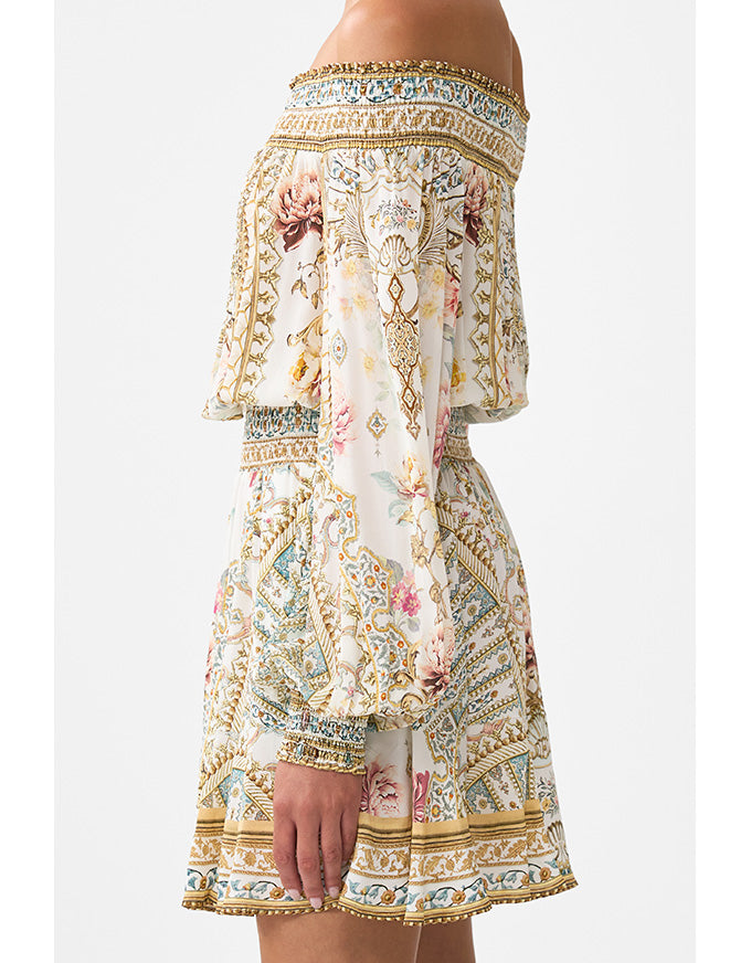 Floral and paisley patterned dress on a white background. Ottoman Dynasty Off The Shoulder Short Dress