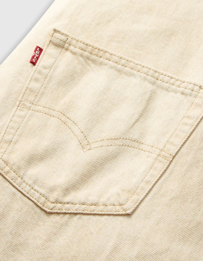 Close-up of beige denim pocket with Levi's logo. Vintage Overall Cloudy Travertine