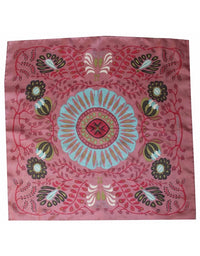 Pink bandana with a central blue design and floral patterns on a white background