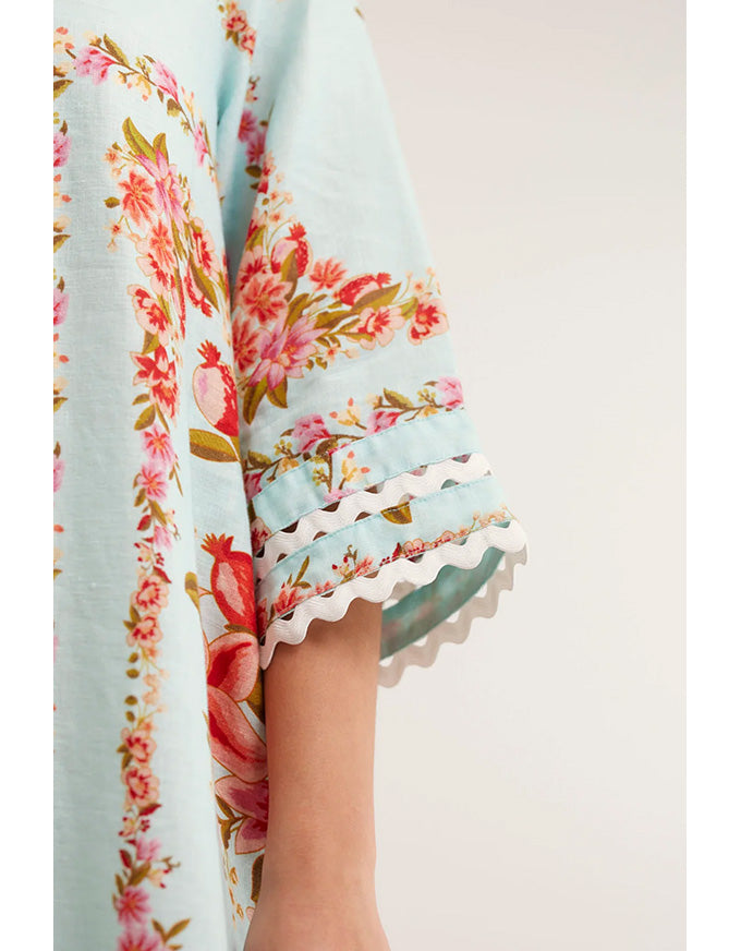 Floral dress with ruffled sleeves on a light background