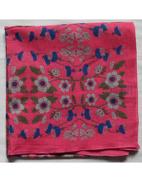 Pink fabric with floral pattern on a white background