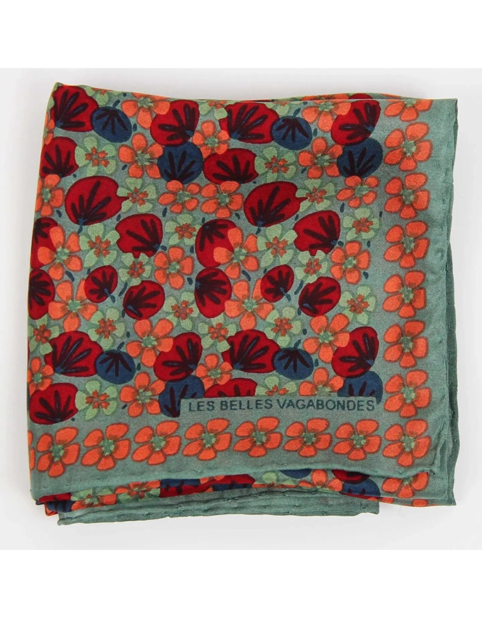 Floral patterned fabric with 'Les Belles Vagabondes' branding on a white background