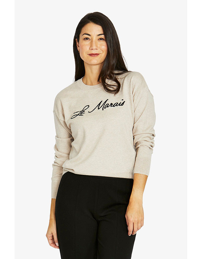 Le Marais pullover in oatmeal with black script logo and crew neckline
