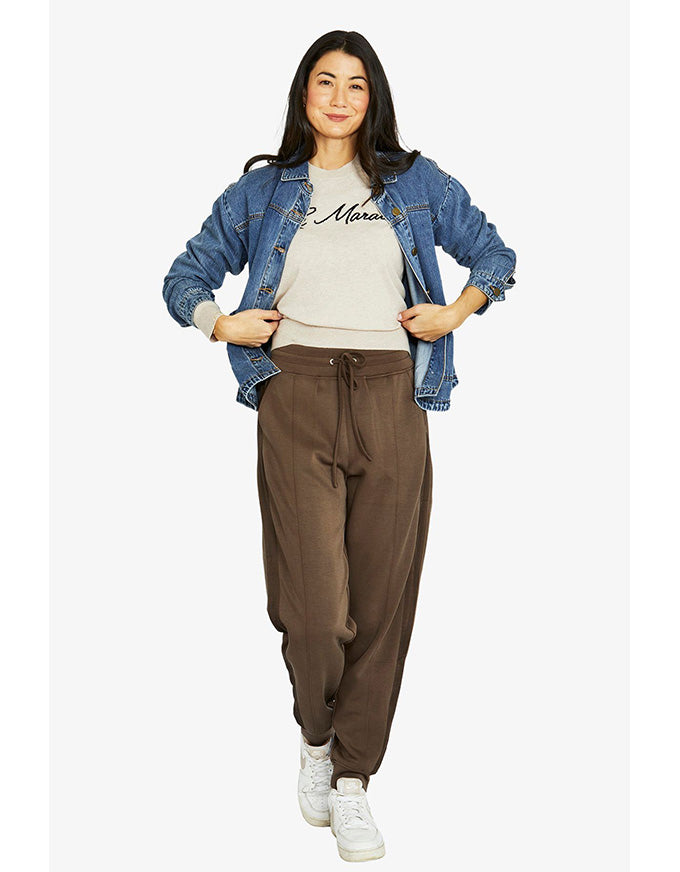 Le Marais pullover in oatmeal with black script logo and crew neckline
