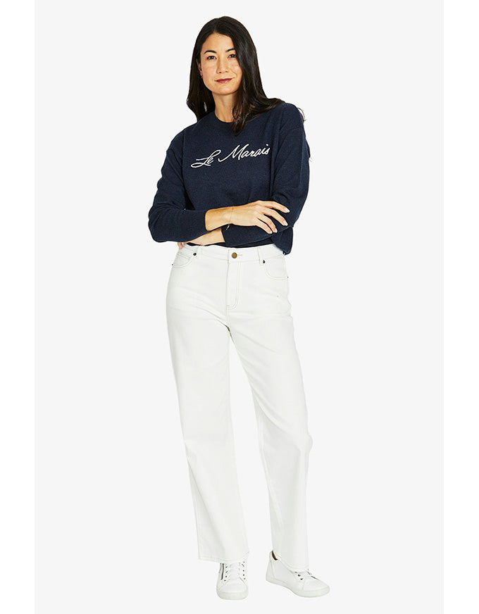 Le Marais pullover in midnight with vanilla script logo and crew neckline