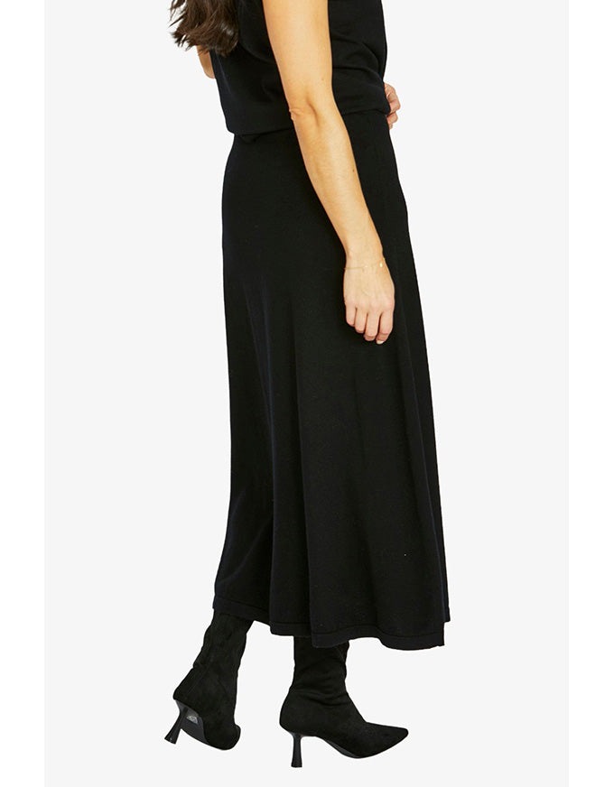 A-line skirt in black with midi length and clean silhouette