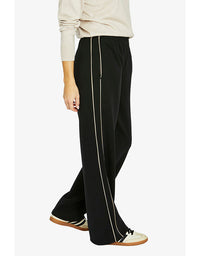 Side stripe lounge pant in black with contrast side stripe and relaxed wide leg