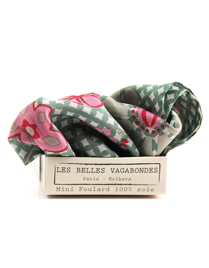 Folded patterned scarf with 'Les Belles Vagabondes' label on a white background