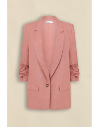 Pink blazer on a beige background