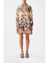 Person wearing a colorful patterned dress on a white background. Notes From The Road L/S Tiered Short Dress