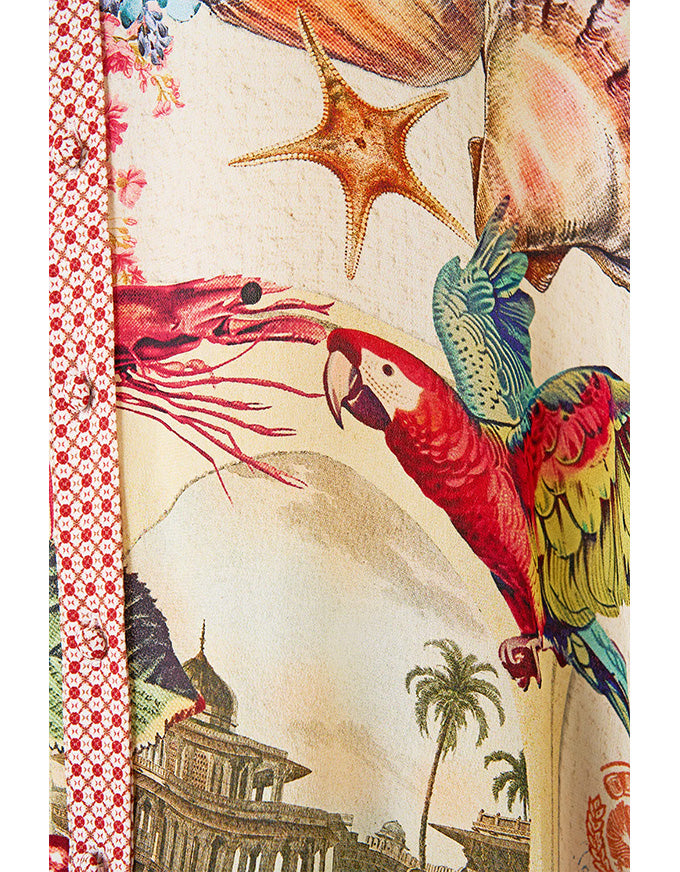 Decorative fabric with parrot, shrimp, and shell design on a beige background. Notes From The Road L/S Tiered Short Dress