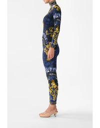 Navy blue jumpsuit with gold floral pattern on a white background