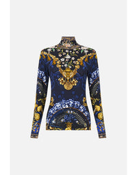 Decorative long-sleeve top with intricate patterns on a white background