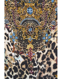 Leopard print fabric with intricate gold and blue embellishments