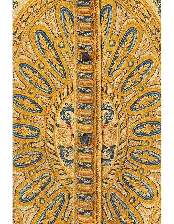 Decorative wooden panel with intricate patterns in gold, blue, and brown.