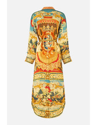 Decorative dress with intricate patterns on a white background