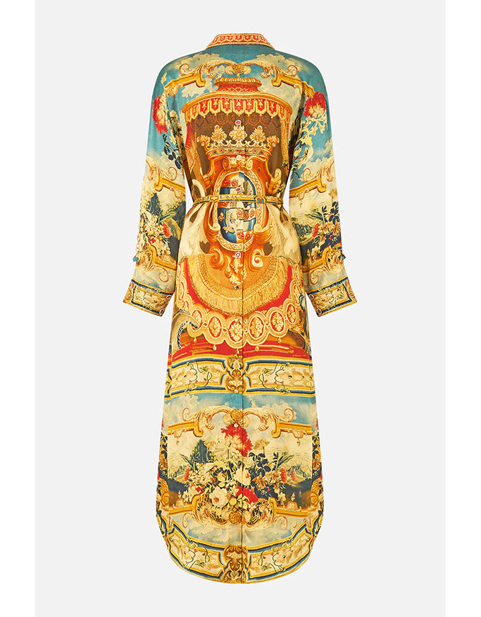 Decorative dress with intricate patterns on a white background