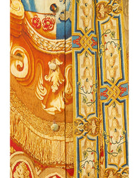 Decorative fabric with intricate patterns and colors on a white background