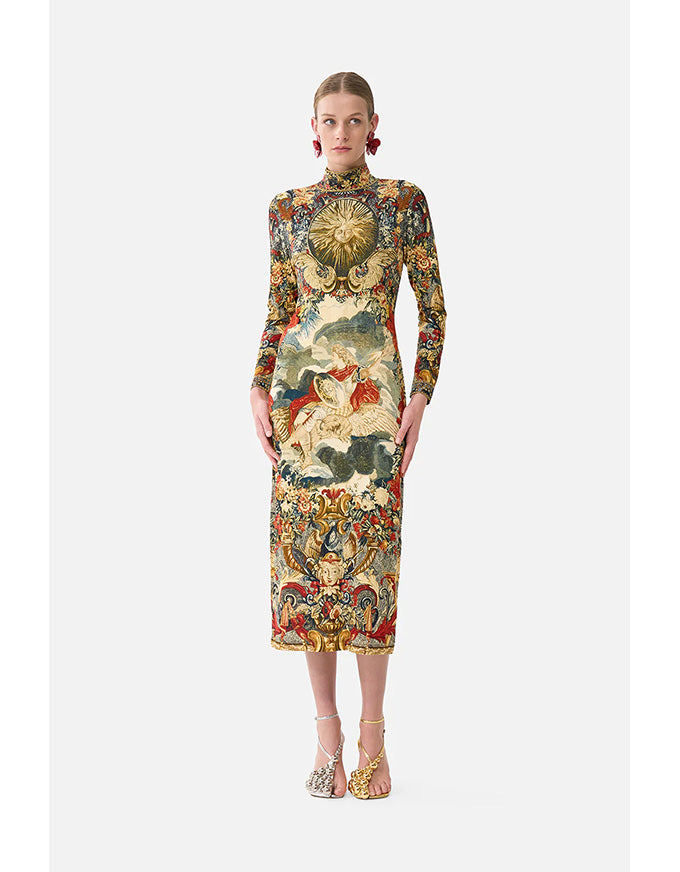 Woman wearing a patterned dress on a white background