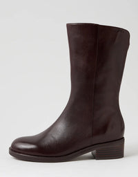 Brown leather boot with decorative stitching on a white background