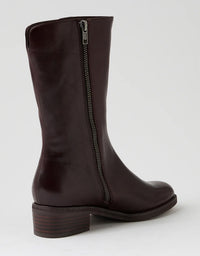 Brown knee-high boot with a zipper on a white background