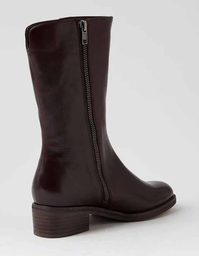 Brown knee-high boot with a zipper on a white background