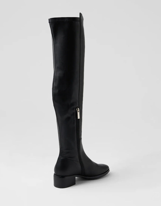 Black knee-high boot on a white background