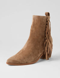 Brown suede ankle boot with fringes on a light gray background