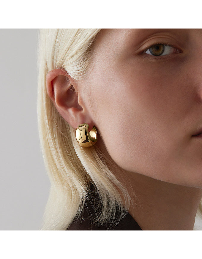 Daynight Yellow Gold Huggie Earrings