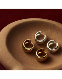 Daynight Yellow Gold Huggie Earrings