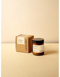 Jar and box of etikette Larapinta on a beige background