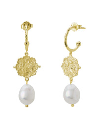Gold hoop earrings with floral designs and pearl drops on a white background
