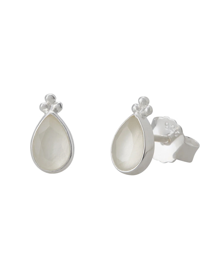 Silver teardrop earrings with pearl-like embellishments on a white background