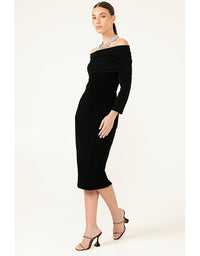Woman wearing a black off-shoulder dress on a white background