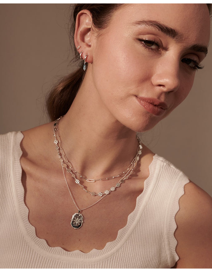 Huggies w Hanging Blue Topaz Baguette Sterling Silver