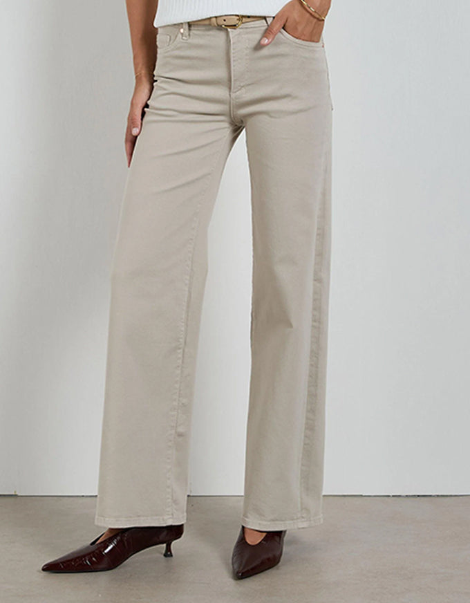 Beige wide-leg pants worn by a person on a plain background