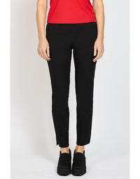 Person wearing black pants and a red top on a white background