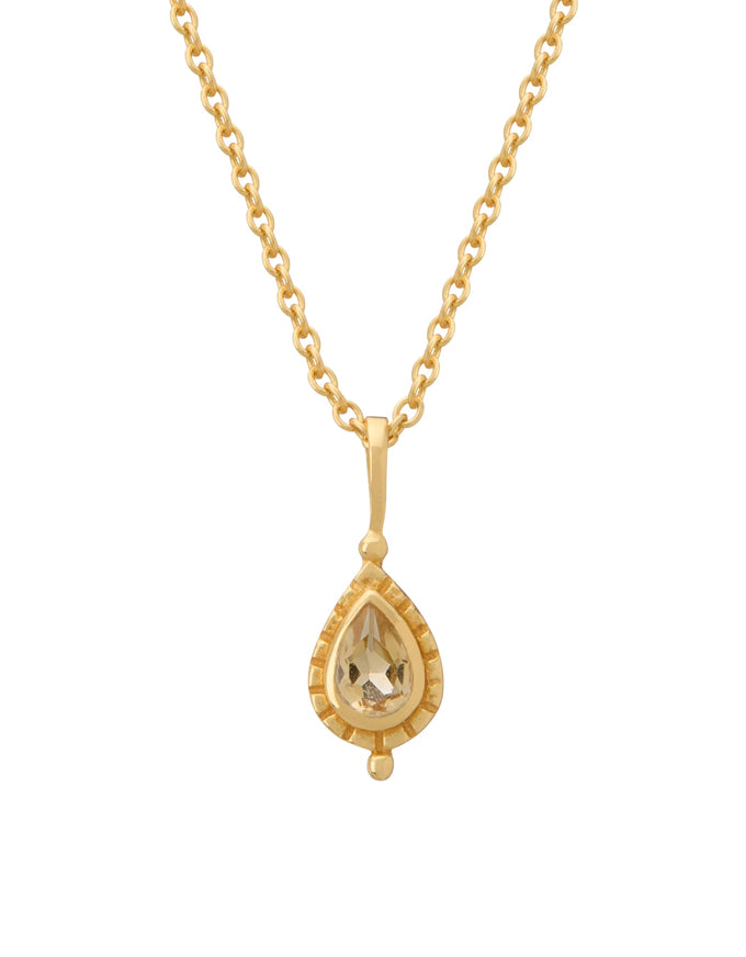 Gold necklace with a teardrop-shaped pendant on a white background
