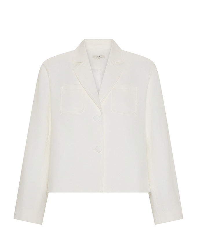An off-white cropped blazer with notch lapels, flap chest pockets, and a single front button, shown on a plain white background.