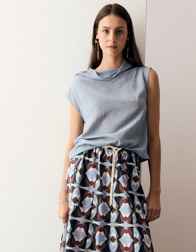 Made from a semi sheer crinkled fabric, the Fennel Cowl Neck Top has a beautiful draped silhouette.