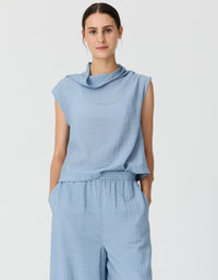 Made from a semi sheer crinkled fabric, the Fennel Cowl Neck Top has a beautiful draped silhouette.