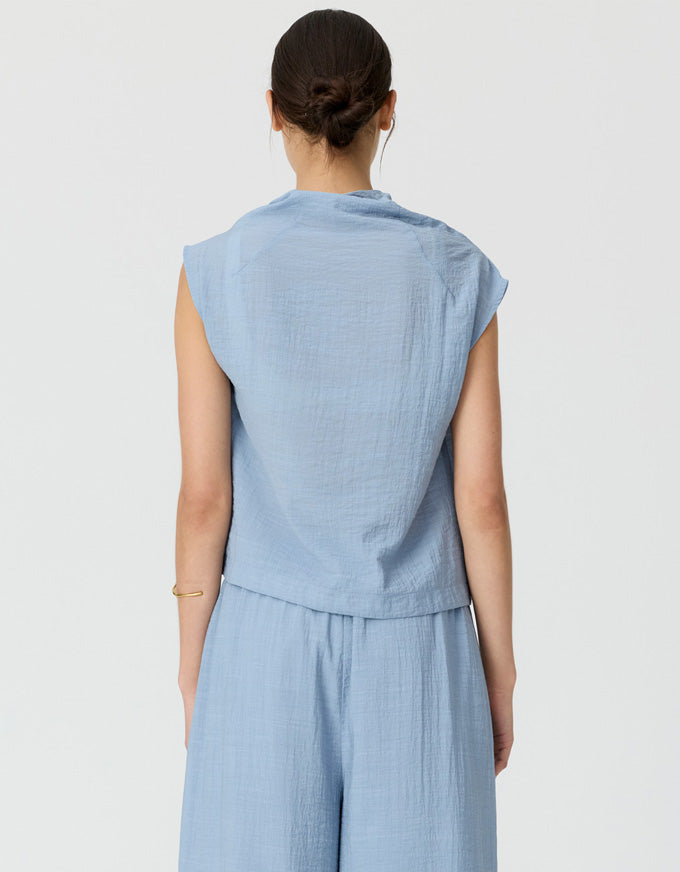 Made from a semi sheer crinkled fabric, the Fennel Cowl Neck Top has a beautiful draped silhouette.