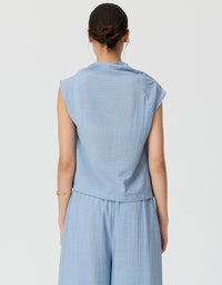 Made from a semi sheer crinkled fabric, the Fennel Cowl Neck Top has a beautiful draped silhouette.
