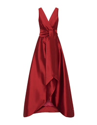 Red evening gown with a deep V-neck and bow detail on a white background