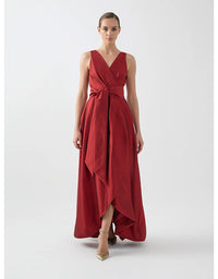 Woman wearing a red dress on a white background