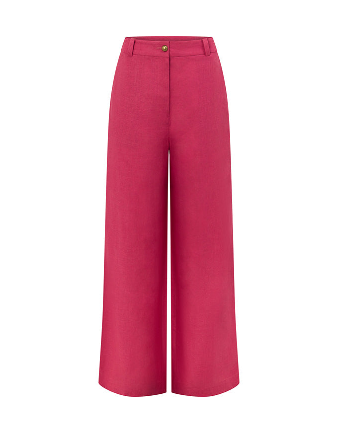 Bright pink wide-leg cropped trousers with a front fly and belt loops, shown on a plain white background. Edit Pant Rhubarb