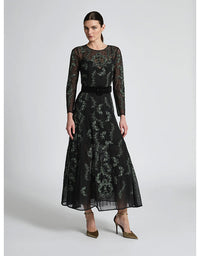 Woman wearing a black lace dress on a white background